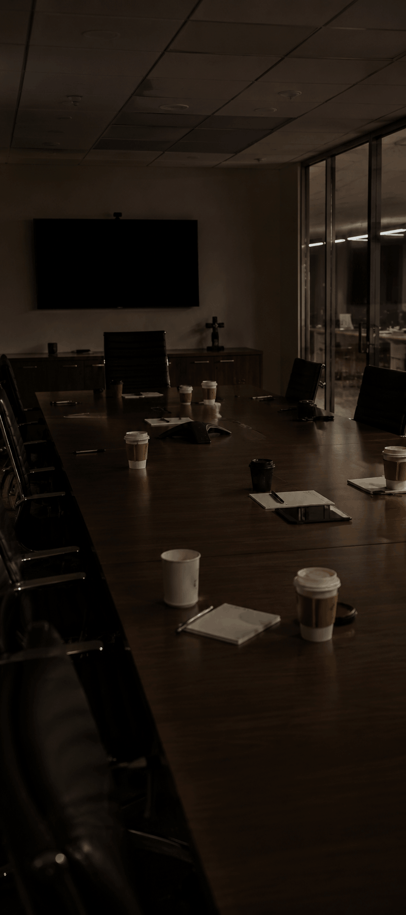 empty cups in empty conference room